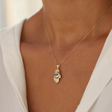 Load image into Gallery viewer, Curved Evil Eye Hamsa Necklace
