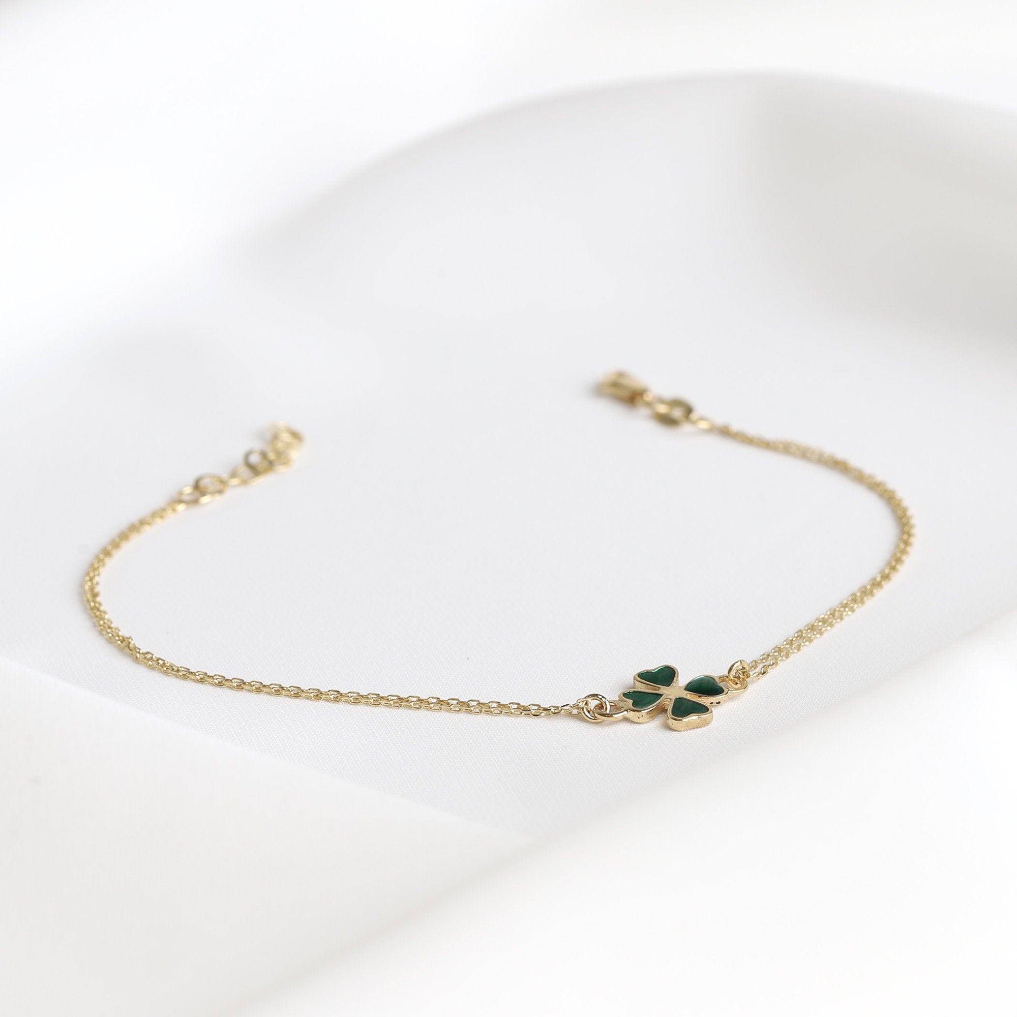 Four Leaf Clover gold plated bracelet with green inlaid