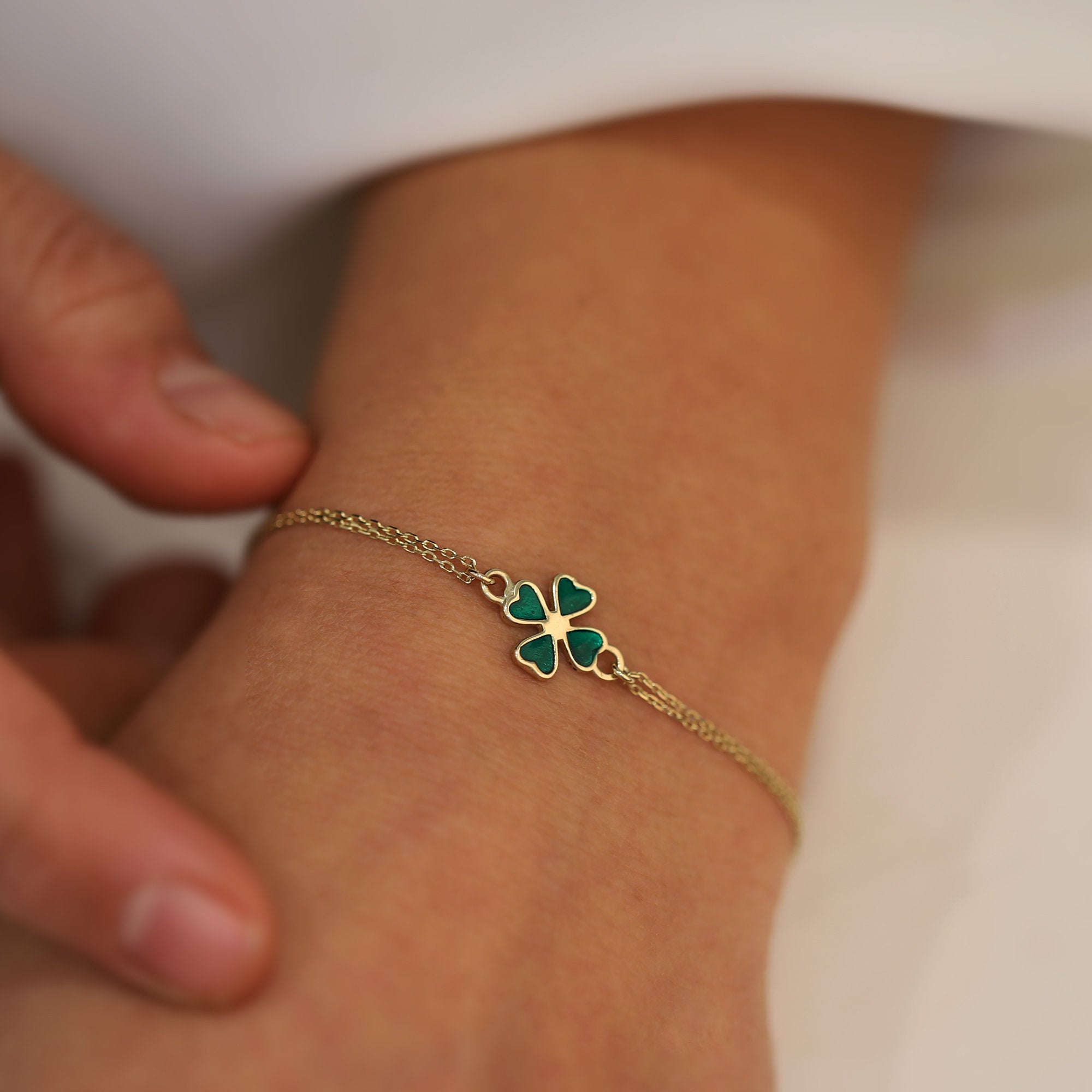 Gold Clover Bracelet with Green Bead