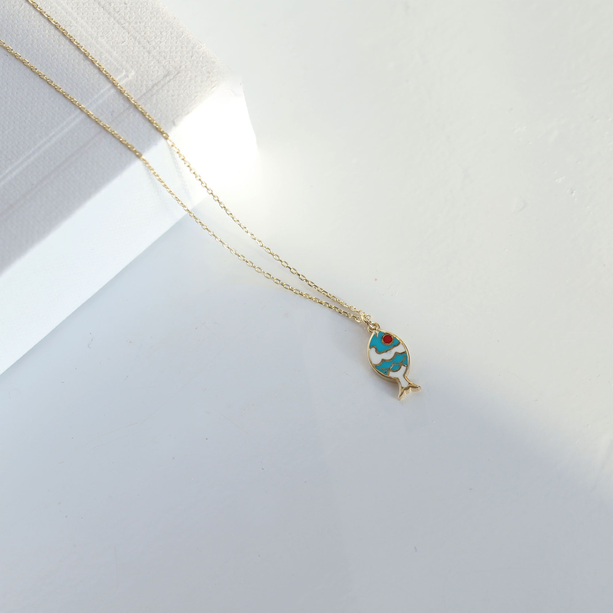 Goldtone Crystal Jesus Fish Cross Necklace | Wholesale Accessory Market